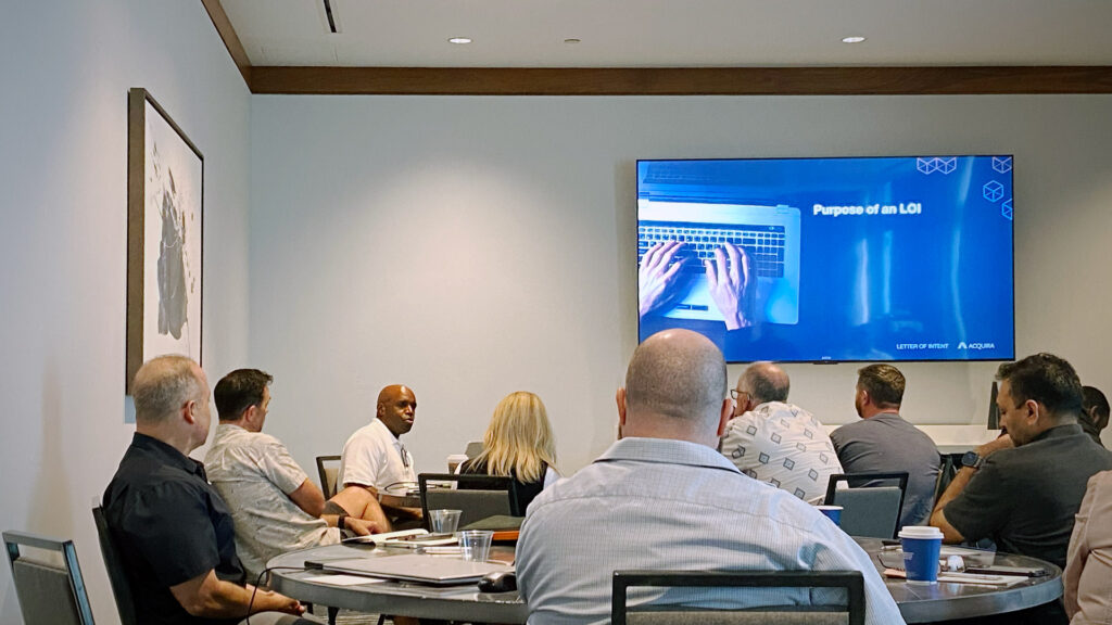Entrepreneurs in active discussion during Acquira’s 3-day Fort Lauderdale workshop, sharing strategies for buying small businesses.