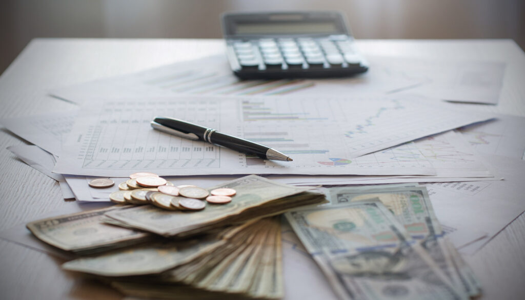Financial charts showing MRR in business growth and customer retention rates